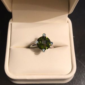 Silver ring with green and blue stones